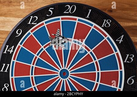 Three Darts with a plastic nib in the triple-twenty of a E-Dart-Board – Score of 180 Stock Photo