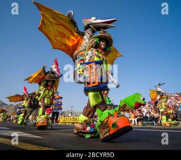 Beautifully dressed dancers, presenting their costumes during the Big Carnival Parade Stock Photo