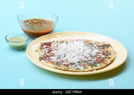 South Indian Food Uttapam Also Known As ooththappam, Rava Uttapam, Uttapa or Uthappa is a Popular South Indian Delicious Spicy Breakfast Snack Stock Photo