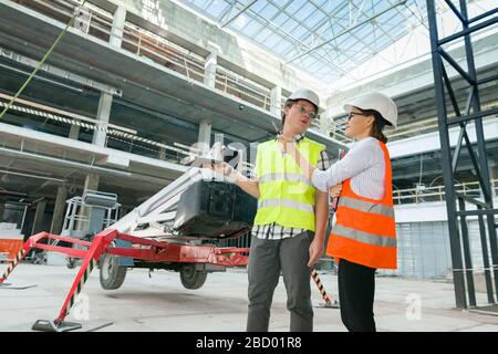 Industrial portrait of male and female construction engineers Stock Photo