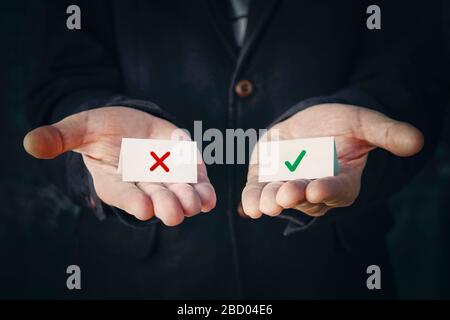 business man select choice. The concept of choosing the right or wrong option. Stock Photo