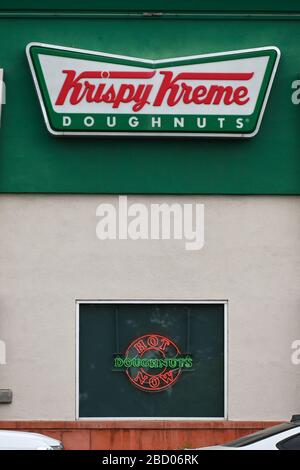 Detailed view of Krispy Kreme logos, Saturday, April 4, 2020, in Ontario, California, USA. (Photo by IOS/Espa-Images) Stock Photo