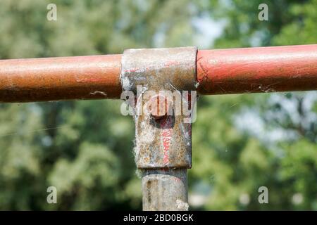 Scaffolding pipe clamp and parts, An important part of building strength to scaffold clamps in used close up on construction site,platforms for stage Stock Photo