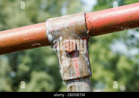 Scaffolding pipe clamp and parts, An important part of building strength to scaffold clamps in used close up on construction site,platforms for stage Stock Photo