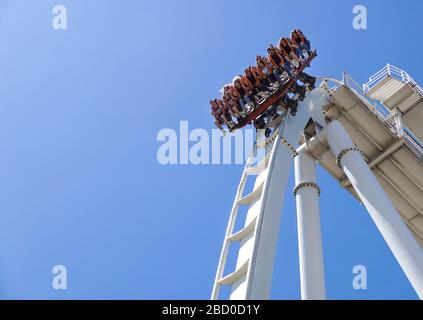 Gardaland, italy 20 june 2019 . Young people screaming during a ride at roller coaster Gardaland park Stock Photo