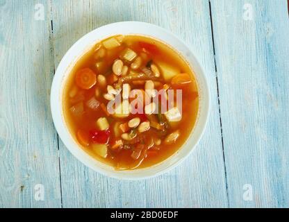 Israeli White Bean Soup, chicken broth and beans. Stock Photo