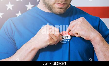 Man putting on Vote button for Presidential election 2020 in America. Stock Photo