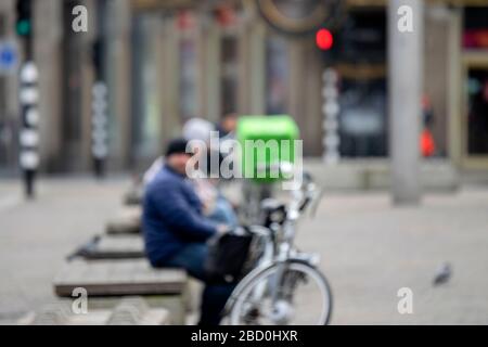 Uber Delivery Bicycle On Purpose Out Of Focus For Privacy Reasons During The Corona Virus Outbreak At Amsterdam The Netherlands 2020 Stock Photo