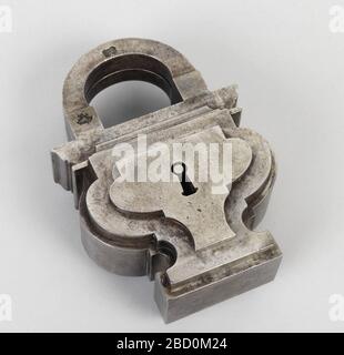 Padlock and key. Research in Progress(a) Padlock in the shape of a footed urn with stepped levels, and arced shackle, with two unidentifiable marks. Padlock and key Stock Photo