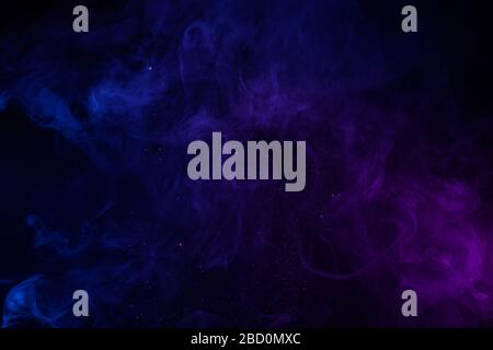 Abstract blue and pink fog with shiny particles dark  background Stock Photo