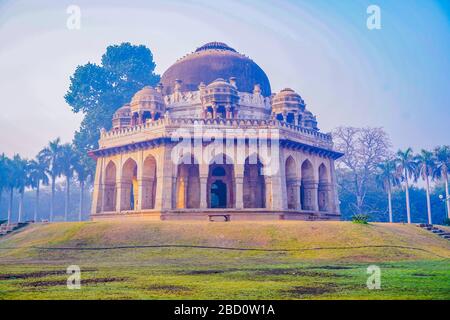 Lodi Gardens or Lodhi Gardens is a city park situated in New Delhi, India. Spread over 90 acres, it contains, Mohammed Shah's Tomb Stock Photo