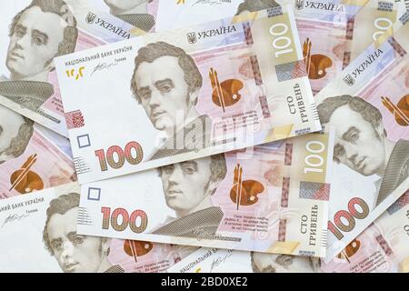 Cash of Ukrainian money, heap of paper banknotes. Pile of hryvnia, uah of national bank of Ukraine Stock Photo