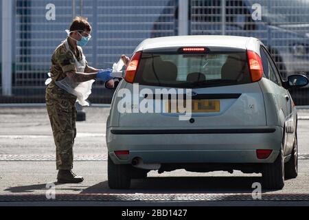 EDITORS NOTE: NUMBER PLATE PIXELATED BY PA PICTURE DESK Picture taken at 1020am of military personnel help administer Covid19 tests for NHS workers at Edgbaston cricket ground in Birmingham, as the UK continues in lockdown to help curb the spread of the coronavirus. Stock Photo