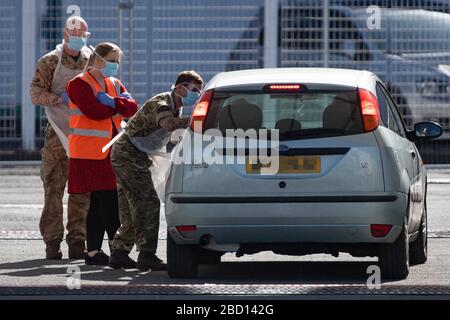 EDITORS NOTE: NUMBER PLATE PIXELATED BY PA PICTURE DESK Picture taken at 1021am of military personnel help administer Covid19 tests for NHS workers at Edgbaston cricket ground in Birmingham, as the UK continues in lockdown to help curb the spread of the coronavirus. Stock Photo