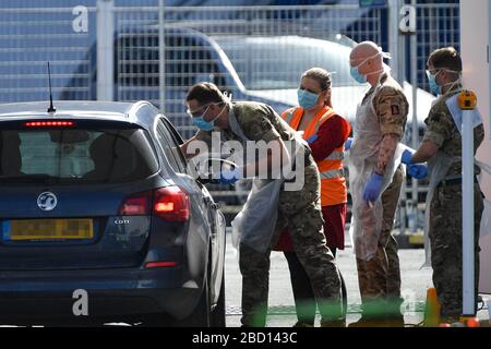 EDITORS NOTE: NUMBER PLATE PIXELATED BY PA PICTURE DESK Picture taken at 1045am of Military personnel help administer Covid19 tests for NHS workers at Edgbaston cricket ground in Birmingham, as the UK continues in lockdown to help curb the spread of the coronavirus. Stock Photo