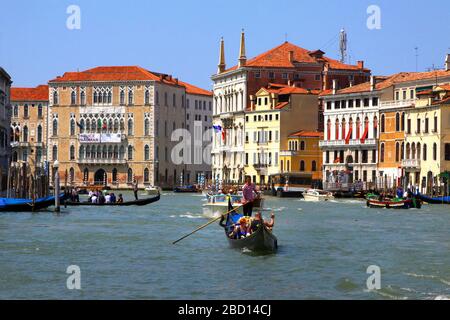 Italy, Venice - 13 June 2019: crowds of tourists in gondolas on the Canal Grande, Venice Stock Photo