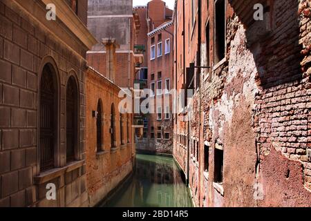 Italy, Venice - 13 June 2019: narrow street of Venice Stock Photo