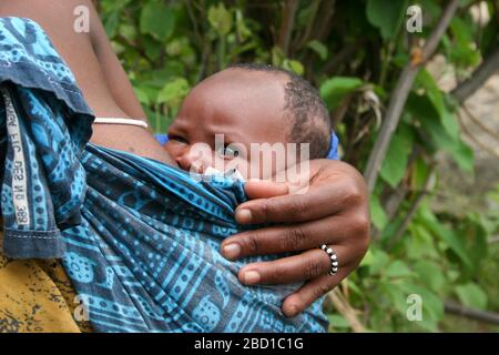 Africa, Tanzania, Lake Eyasi, young male Hadza child. Hadza, or Hadzabe, are an indigenous ethnic group in north-central Tanzania, living around Lake Stock Photo