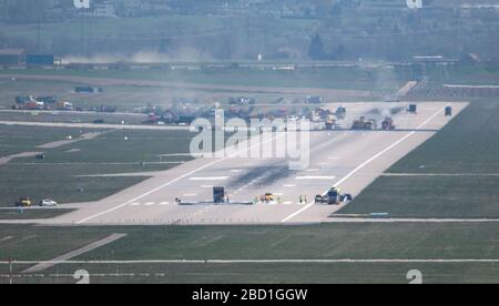 Stuttgart, Germany. 06th Apr, 2020. Construction vehicles can be seen on the airport runway. Stuttgart Airport is closed due to the renewal of the runway. According to the airport, there will be no air traffic until 22 April. The renovation of the runway was planned for this year anyway, but should have started a little later. Credit: Marijan Murat/dpa/Alamy Live News Stock Photo