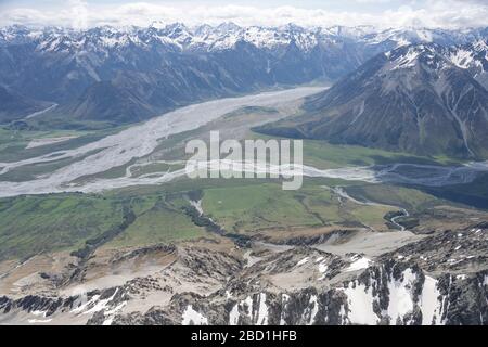 aerial, from a glider, with mt. Glen Lyon at Dobson and Hopkins rivers confluence, shot in bright spring light from west, Canterbury, South Island, Ne Stock Photo