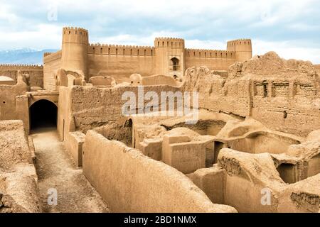 Ruins, towers and walls of Rayen Citadel, biggest adobe building in the world, Rayen, Kerman Province, Iran, Middle East Stock Photo