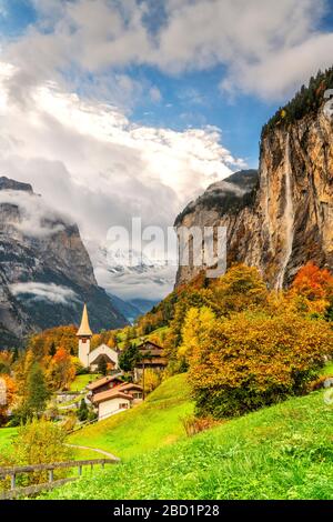 Alpine village of Lauterbrunnen and Trummelbach Falls cascade in autumn, canton of Bern, Bernese Oberland, Switzerland, Europe Stock Photo