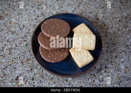 plate of biscuits, mixed biscuits sitting on a plate Stock Photo