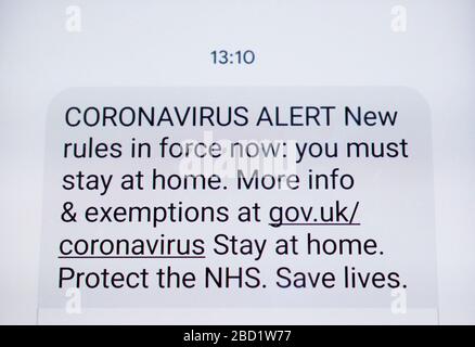 The coronavirus covid-19 lockdown instruction text sent to all British people by the Government in March 2020 during the early stages of the pandemic Stock Photo