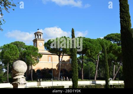 Casina dell'Orologio and Piazza di Siena in the Villa Borghese Park in the city of Rome, Italy Stock Photo