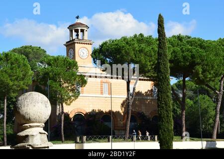 Casina dell'Orologio and Piazza di Siena in the Villa Borghese Park in the city of Rome, Italy Stock Photo