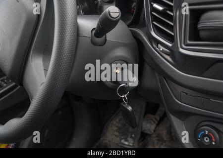 The ignition key in the car's ignition lock Stock Photo