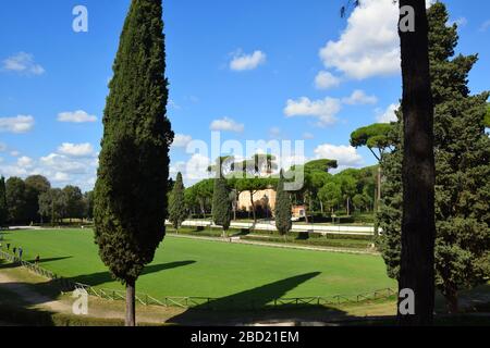 Casina dell'Orologio and Piazza di Siena in the Villa Borghese Park in the city of Rome, Italy Stock Photo