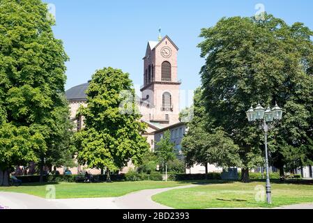 Karlsruhe, Germany - July 27, 2018. Cityscape with garden square before St. Stephan Church in a summer day in city Karlsruhe, Baden-Wuerttemberg, Germ Stock Photo