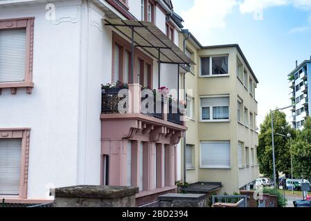 Karlsruhe, Germany - July 27, 2018. Urban landscape with view of house's facades with balcones and flowers in residential block in city Karlsruhe, Bad Stock Photo