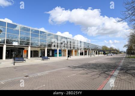 Central Milton Keynes Buildings Snow Dome Outdoor Market  Blossom Reflections on glass centre  Signage Corona Virus Covid 19 Grid system Stock Photo