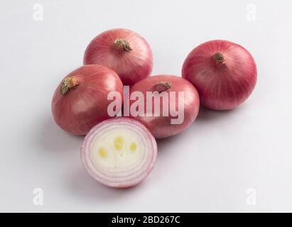 Red onion bulbs isolated on white background Stock Photo