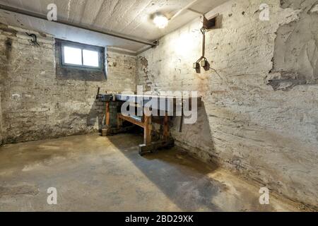 Abandoned empty old dark underground cellar Stock Photo