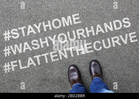 Stay home hashtag stayhome flatten the curve corona virus coronavirus man business concept illness Stock Photo