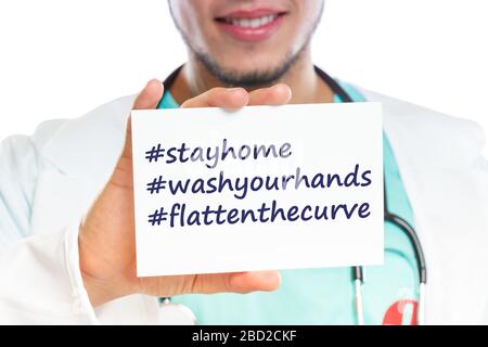 Stay home hashtag stayhome flatten the curve Corona virus coronavirus disease doctor healthy health with sign Stock Photo