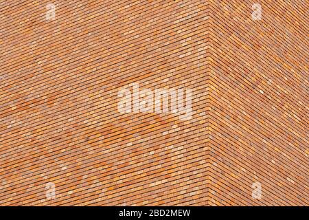 Red brick building wall corner close up Stock Photo