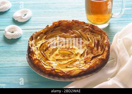 Homemade Apple pie with cottage cheese and tea are on the table. Delicious breakfast Stock Photo