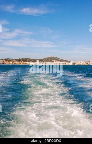 Wide angle seascape view of the wake of a fast ferry in the south of France Stock Photo
