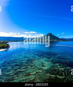 Aerial view, coast with clear water, behind the mountain Tourelle du Tamarin, Flic en Flac, Mauritius Stock Photo