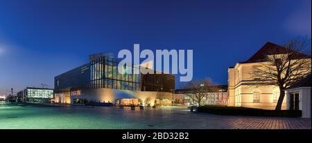 German emigrant house, illuminated, night shot, panorama, Bremerhaven, Germany Stock Photo