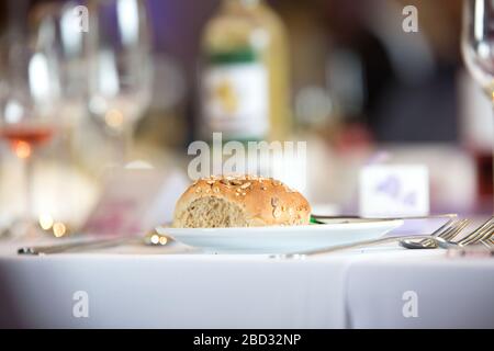 wedding breakfast restaurant starter bread on a plate on a table Stock Photo