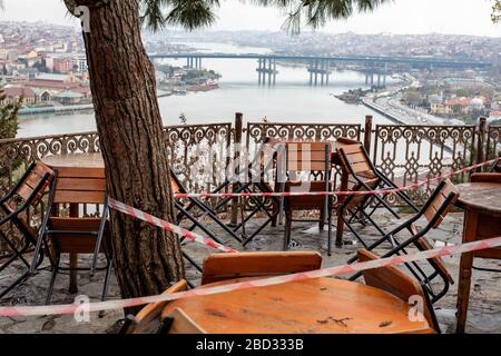 Chairs and tables are sealed off from customers at Istanbul's famous Pierre Loti cafe in Eyup, Istanbul. Stock Photo