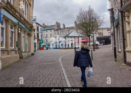 A deserted Kendal marketplace as a result of the lockdown caused by the Coronavirus /Covid 19 outbreak showing closed shops and a lack of people Stock Photo
