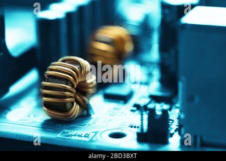 Blue electronic mother board circuit close up macro background. Stock Photo