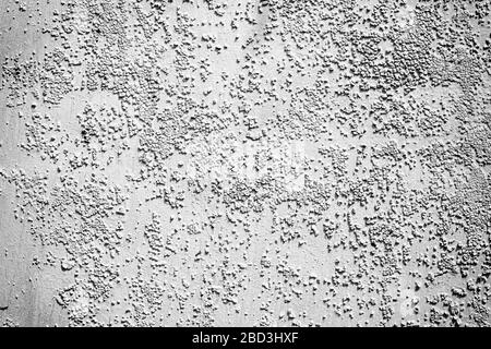 Surface of the old metal wall is covered with a lot of cracks. Destruction of the old cracked paint. Grunge background texture. Stock Photo