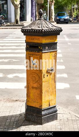 Old yellow post box in Colonia del Sacramento, Uruguay. Stock Photo